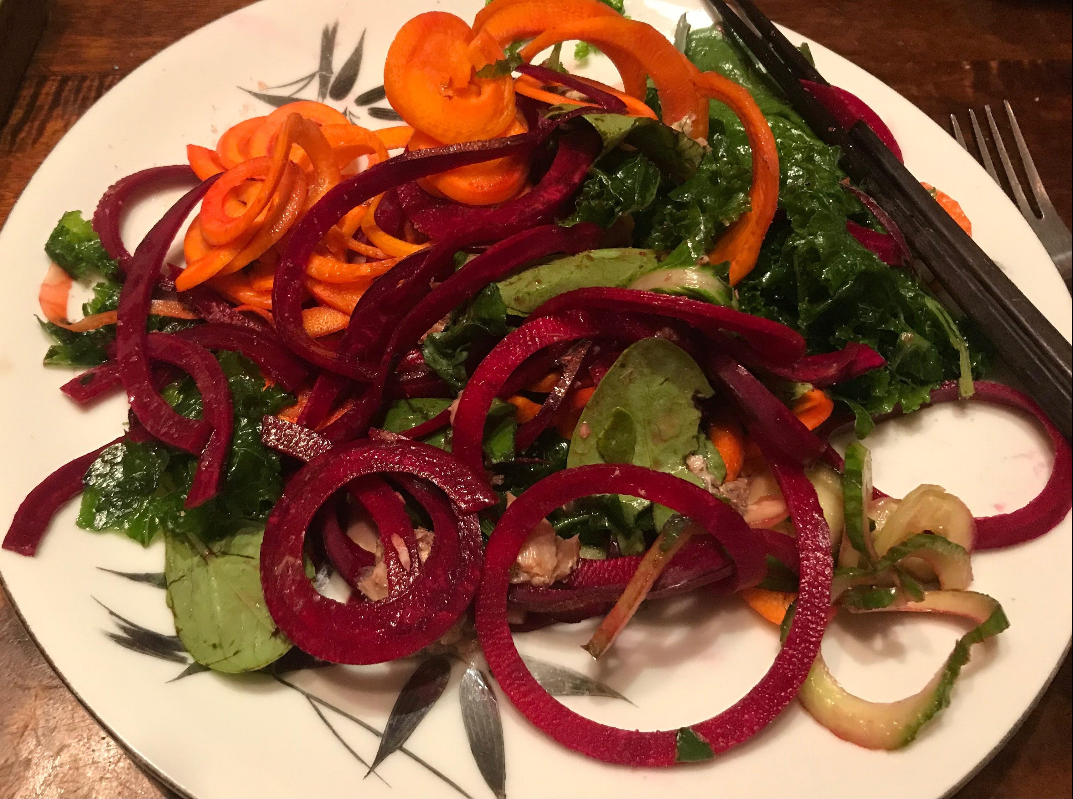 spiralized beets and carrots with massaged kale and topped with sardines! Yummmmm...